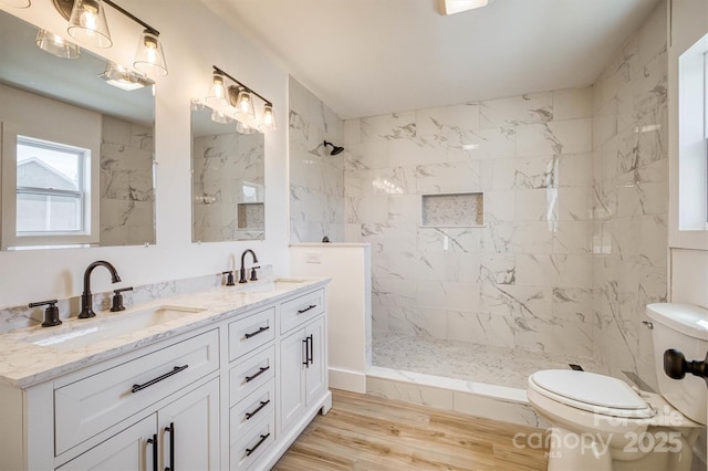 2934 Drummond St, Connelly Springs, NC 28612 - full bath with toilet, a marble finish shower, double vanity, and wood finished floors