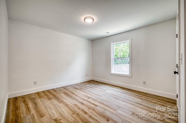 2934 Drummond St, Connelly Springs, NC 28612 - empty room featuring wood finished floors and baseboards