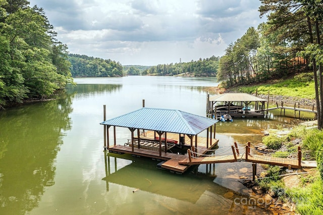 150 Edgewater Ct, Granite Falls, NC 28630 - dock area with boat lift, a water view, and a forest view