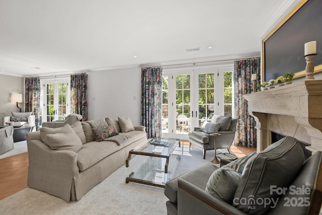 1625 Bibury Ln, Charlotte, NC 28211 - living room featuring french doors, ornamental molding, and a fireplace