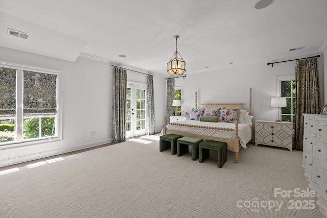 1625 Bibury Ln, Charlotte, NC 28211 - bedroom with french doors, ornamental molding, light carpet, and access to outside
