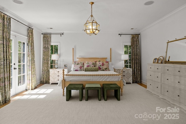 1625 Bibury Ln, Charlotte, NC 28211 - bedroom with ornamental molding, access to exterior, multiple windows, carpet floors, and baseboards