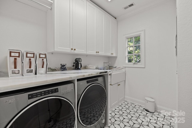 1625 Bibury Ln, Charlotte, NC 28211 - washroom featuring separate washer and dryer, cabinet space, baseboards, and crown molding