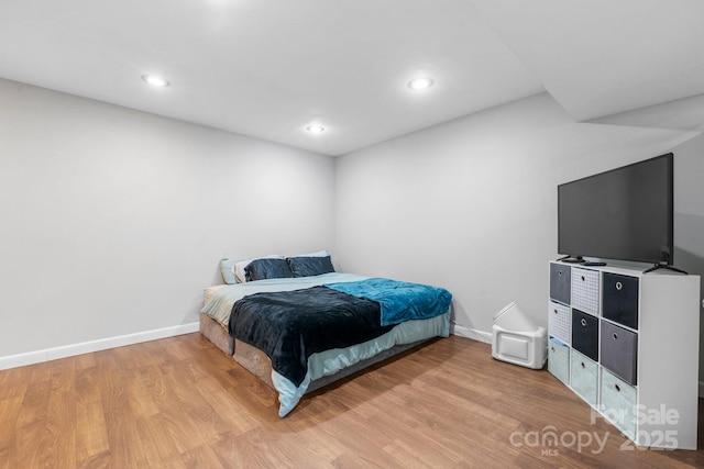 1525 16th Avenue Cir NW, Hickory, NC 28601 - bedroom featuring light wood-style flooring, baseboards, and recessed lighting