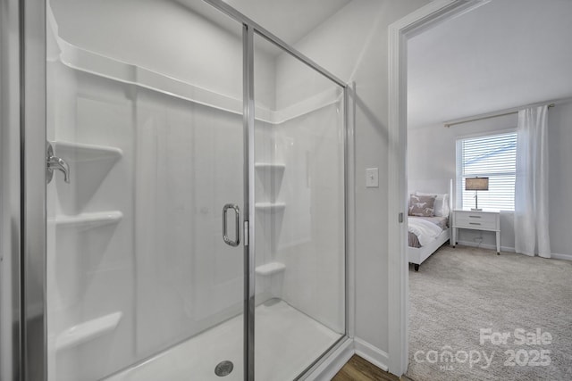 149 Briana Marie Way, Indian Trail, NC 28079 - bathroom featuring a stall shower, ensuite bath, and baseboards