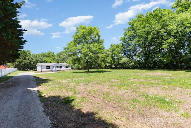 4750 Enochville Rd, Kannapolis, NC 28081 - view of yard with asphalt driveway