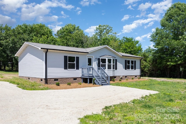 4750 Enochville Rd, Kannapolis, NC 28081 - manufactured / mobile home with crawl space, a front yard, and driveway