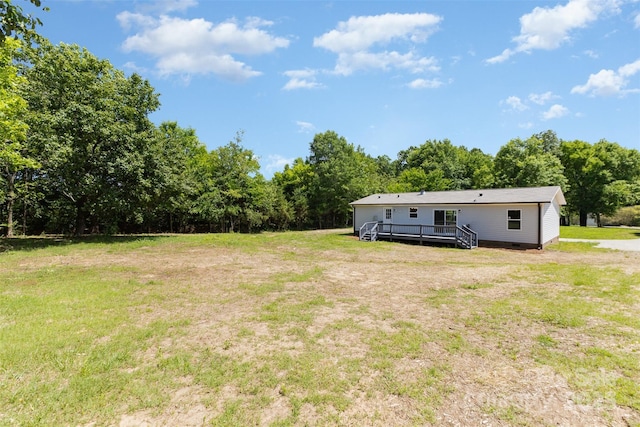 4750 Enochville Rd, Kannapolis, NC 28081 - view of grassy yard featuring a deck