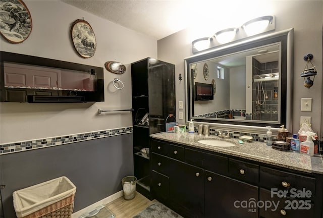 74 Sunflower Ln, Waynesville, NC 28785 - bathroom featuring vanity and wood finished floors