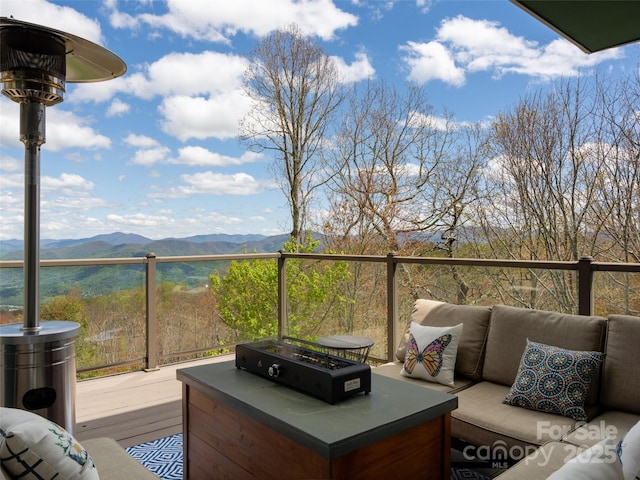 4344 Eagles Nest Rd, Waynesville, NC 28786 - deck featuring a mountain view and an outdoor living space with a fire pit
