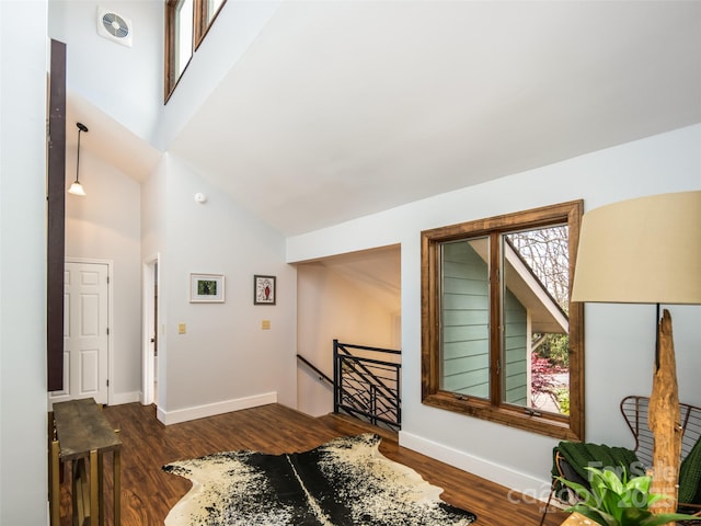 4344 Eagles Nest Rd, Waynesville, NC 28786 - entryway with dark wood-type flooring, a high ceiling, healthy amount of natural light, and baseboards