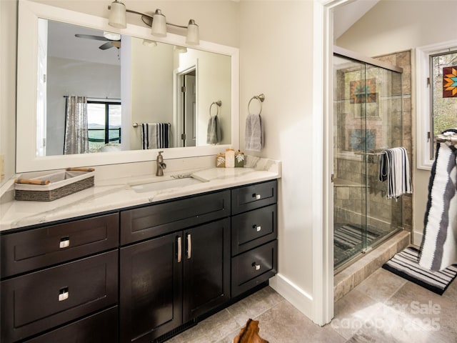 4344 Eagles Nest Rd, Waynesville, NC 28786 - full bath with vanity, a stall shower, tile patterned floors, ceiling fan, and baseboards