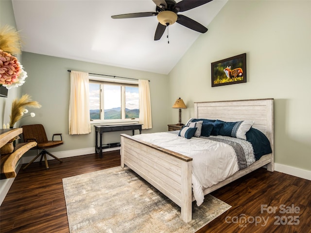 4344 Eagles Nest Rd, Waynesville, NC 28786 - bedroom featuring lofted ceiling, baseboards, wood finished floors, and a ceiling fan