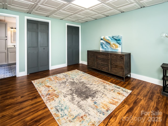 4344 Eagles Nest Rd, Waynesville, NC 28786 - bedroom with baseboards, dark wood finished floors, and an ornate ceiling