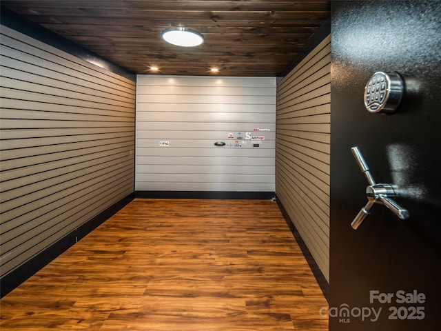 4344 Eagles Nest Rd, Waynesville, NC 28786 - detailed view of wooden walls, wood ceiling, and wood finished floors