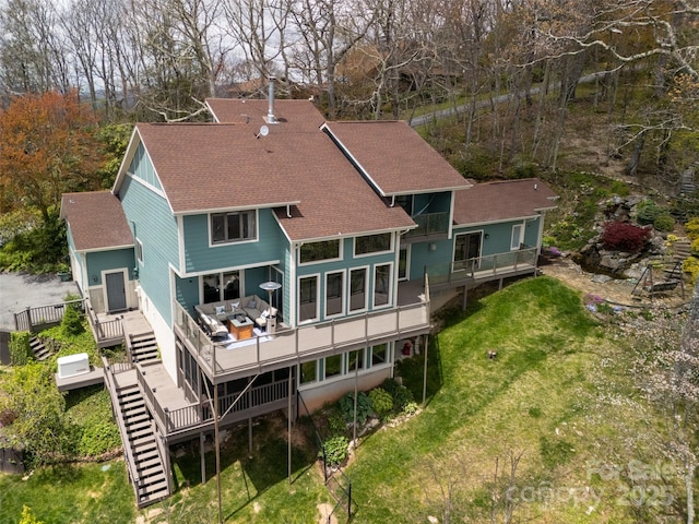 4344 Eagles Nest Rd, Waynesville, NC 28786 - rear view of house featuring a shingled roof, stairway, a deck, and a lawn