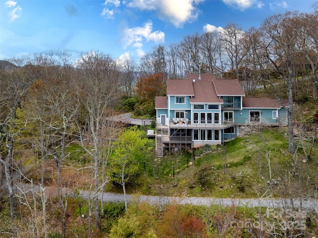 4344 Eagles Nest Rd, Waynesville, NC 28786 - rear view of house with a wooden deck and roof with shingles