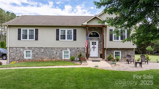 5750 Ellenwood Dr, Granite Falls, NC 28630 - raised ranch with stone siding, a front lawn, and roof with shingles