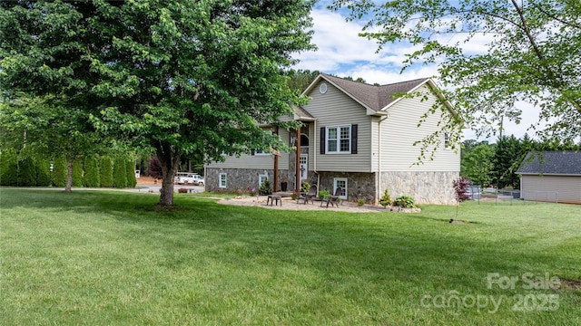 5750 Ellenwood Dr, Granite Falls, NC 28630 - back of house with a lawn, a patio area, and stone siding