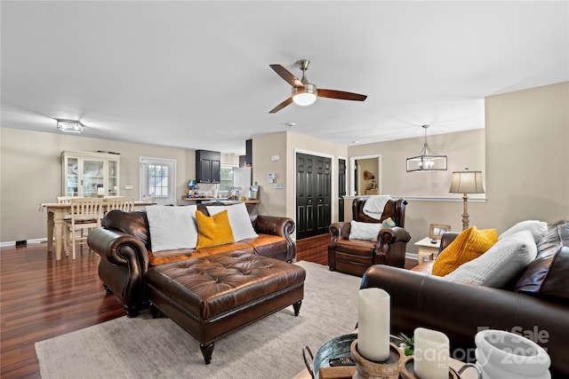 5750 Ellenwood Dr, Granite Falls, NC 28630 - living room with a ceiling fan, wood finished floors, and baseboards