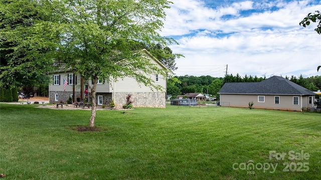 5750 Ellenwood Dr, Granite Falls, NC 28630 - view of grassy yard with a patio