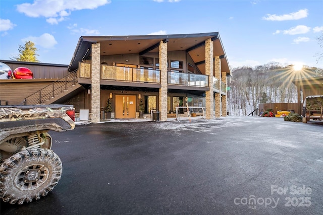 14518 Big Laurel Rd, Mars Hill, NC 28754 - rear view of house with stone siding and stairs