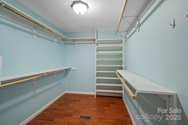 14518 Big Laurel Rd, Mars Hill, NC 28754 - walk in closet with dark wood-type flooring