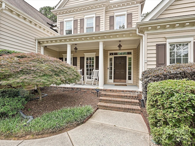 2406 Tarleton Twins Ter, Charlotte, NC 28270 - doorway to property with a porch