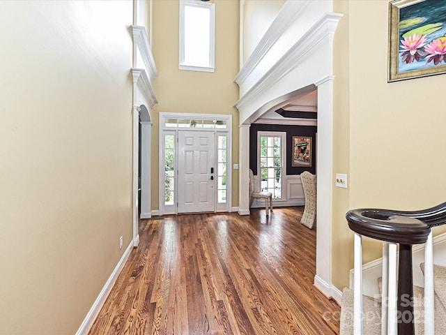 2406 Tarleton Twins Ter, Charlotte, NC 28270 - entrance foyer featuring wood finished floors, a high ceiling, and baseboards