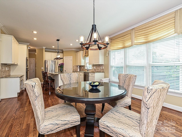 2406 Tarleton Twins Ter, Charlotte, NC 28270 - dining area featuring a chandelier, ornamental molding, dark wood-style flooring, baseboards, and recessed lighting