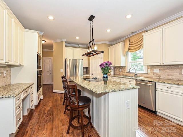 2406 Tarleton Twins Ter, Charlotte, NC 28270 - kitchen with black appliances, a kitchen island, a breakfast bar area, light stone counters, and a sink
