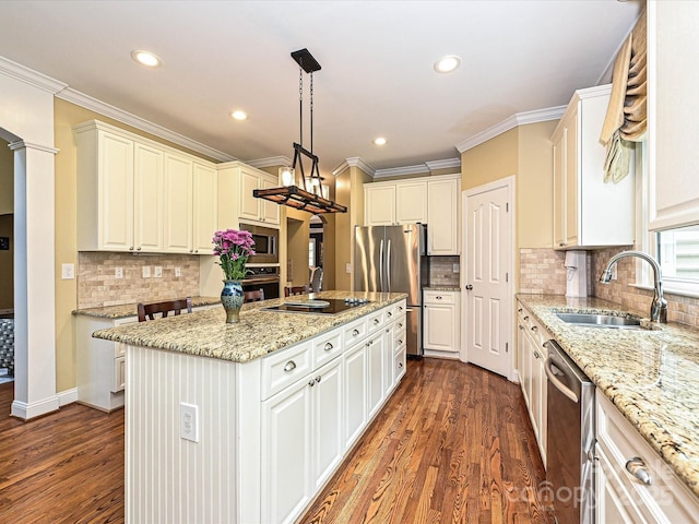 2406 Tarleton Twins Ter, Charlotte, NC 28270 - kitchen featuring a sink, stainless steel appliances, crown molding, dark wood-style floors, and light stone counters
