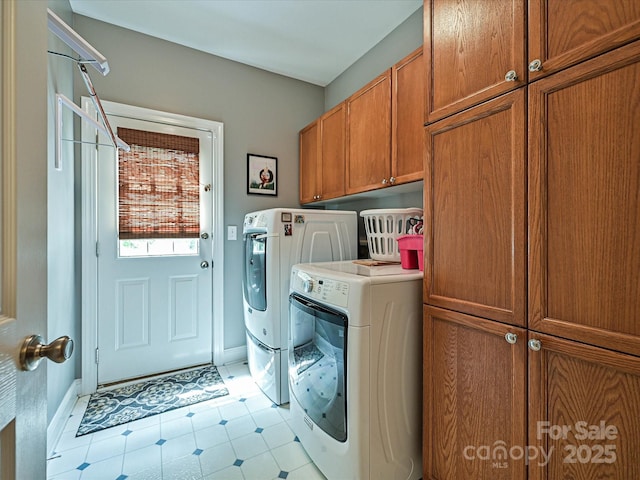 2406 Tarleton Twins Ter, Charlotte, NC 28270 - washroom featuring cabinet space, separate washer and dryer, baseboards, and light tile patterned flooring