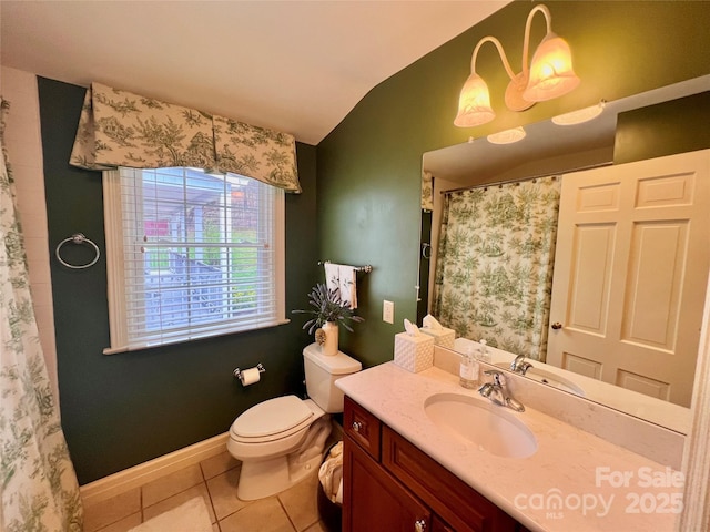 303 Wade E Vannoy Dr, West Jefferson, NC 28694 - full bath with toilet, vanity, vaulted ceiling, tile patterned flooring, and a shower with shower curtain