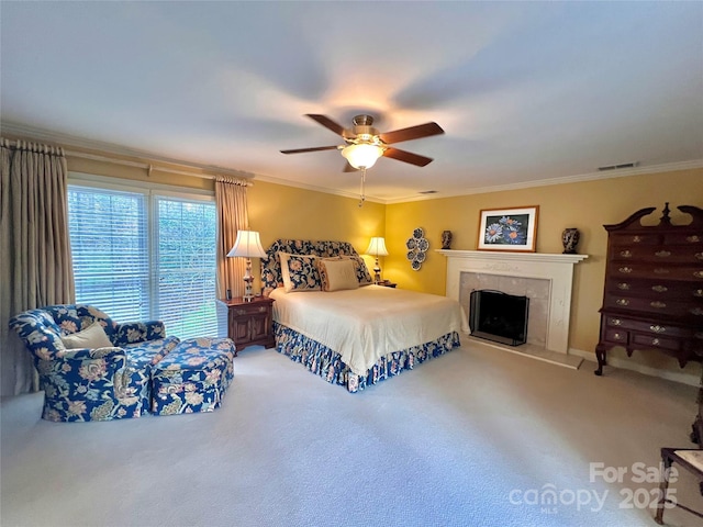 303 Wade E Vannoy Dr, West Jefferson, NC 28694 - bedroom with carpet floors, crown molding, ceiling fan, and a fireplace