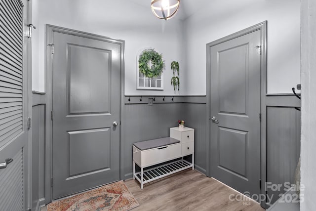 1725 Mill Creek Ln SW, Concord, NC 28025 - mudroom with wood finished floors and a wainscoted wall