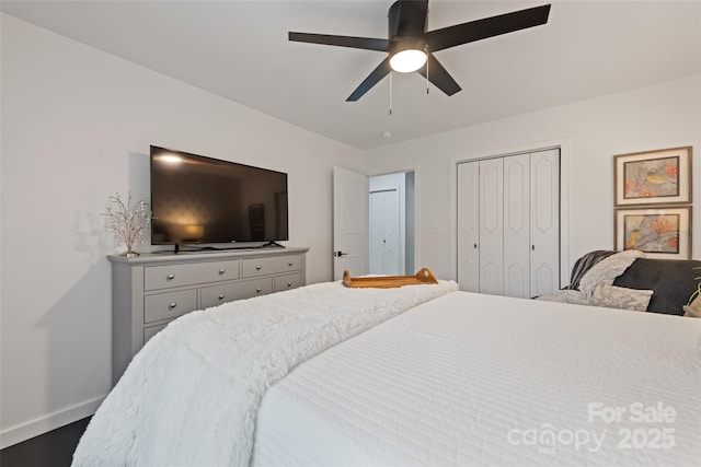 225 Valley View Ter, Waynesville, NC 28786 - bedroom with dark wood finished floors, a closet, and ceiling fan