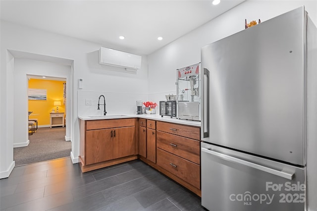 225 Valley View Ter, Waynesville, NC 28786 - kitchen with freestanding refrigerator, light countertops, brown cabinetry, recessed lighting, and tasteful backsplash