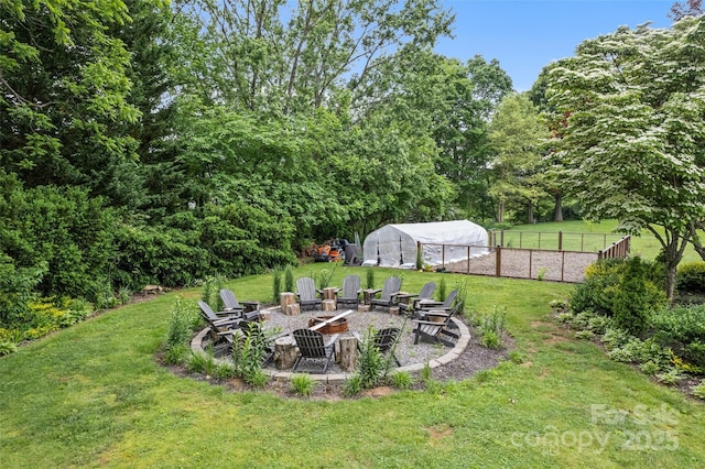 225 Valley View Ter, Waynesville, NC 28786 - view of yard with an outdoor fire pit, an exterior structure, and an outdoor structure