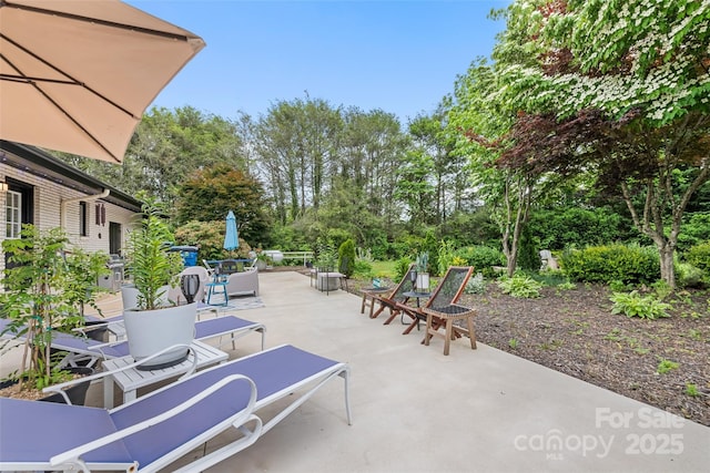 225 Valley View Ter, Waynesville, NC 28786 - view of patio / terrace with outdoor dining area and view of wooded area