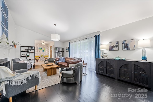 225 Valley View Ter, Waynesville, NC 28786 - living area with lofted ceiling, dark wood-style floors, and a fireplace