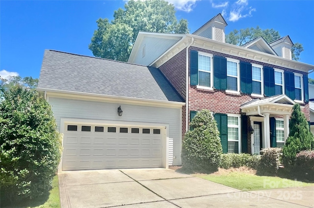 1025 N Sharon Amity Rd, Charlotte, NC 28211 - view of front of home featuring driveway, an attached garage, and a shingled roof