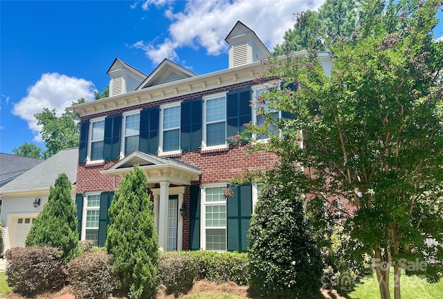 1025 N Sharon Amity Rd, Charlotte, NC 28211 - view of front of home featuring an attached garage and brick siding