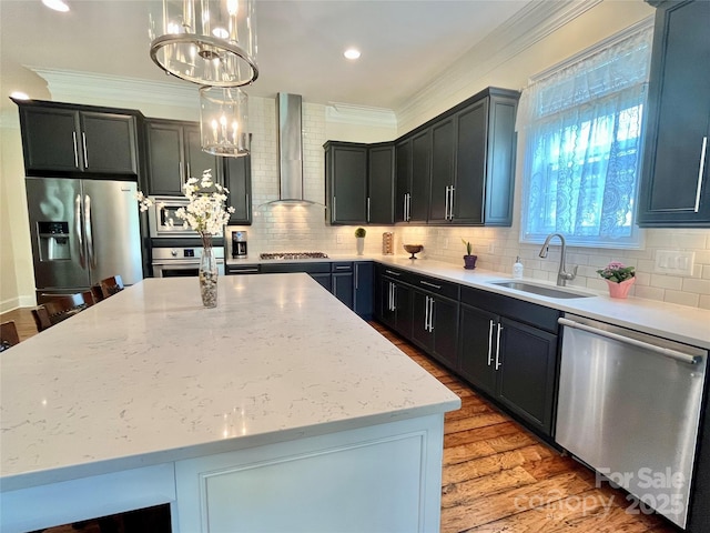 1025 N Sharon Amity Rd, Charlotte, NC 28211 - kitchen with a sink, stainless steel appliances, wall chimney range hood, a chandelier, and a kitchen island