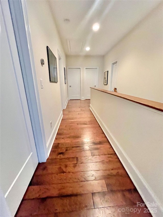 1025 N Sharon Amity Rd, Charlotte, NC 28211 - hall with attic access, wood-type flooring, baseboards, and recessed lighting