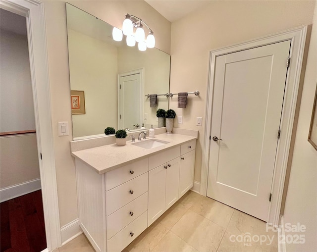 1025 N Sharon Amity Rd, Charlotte, NC 28211 - bathroom featuring vanity and baseboards