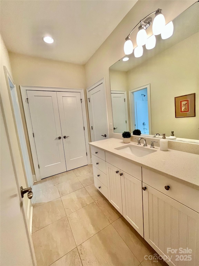 1025 N Sharon Amity Rd, Charlotte, NC 28211 - bathroom with vanity and tile patterned flooring