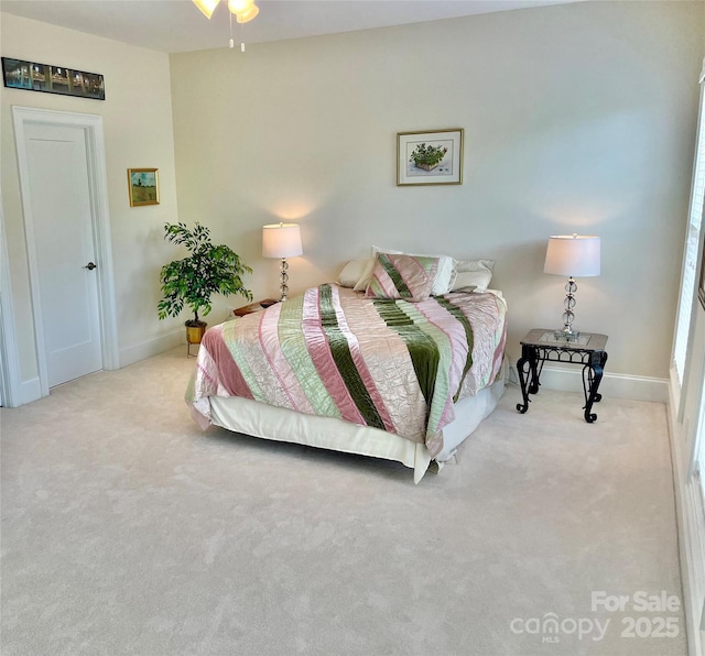 1025 N Sharon Amity Rd, Charlotte, NC 28211 - carpeted bedroom featuring baseboards