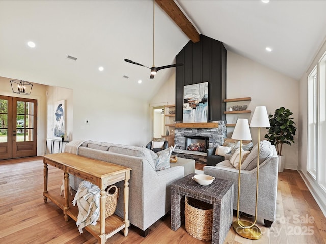 1172 Springlake Rd, York, SC 29745 - living room featuring a fireplace, light wood-type flooring, beam ceiling, recessed lighting, and high vaulted ceiling