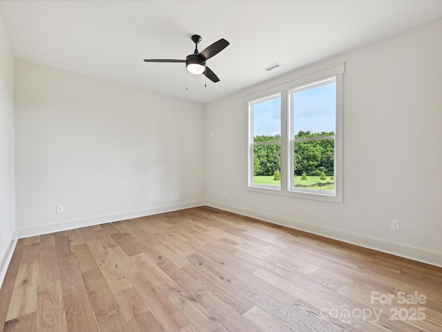1172 Springlake Rd, York, SC 29745 - spare room with light wood finished floors, ceiling fan, and baseboards